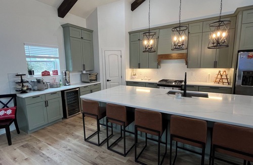 Izoro House | Forget your worries in this spacious and serene space.