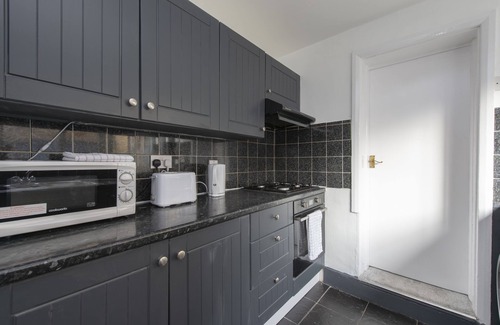 Greenwich House | Fortified Cosy Three Bedroom Home Close to bus station with free Parking