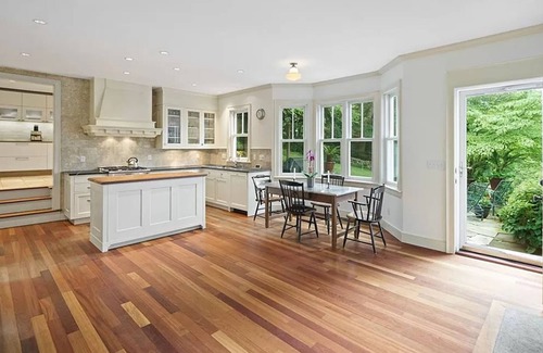 New Canaan House | Fountain Courtyard and Fireplace Kitchen