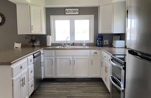 Kincheloe House | Four Bedroom Family and Pet Friendly Home on a Quiet, Private LAKE!