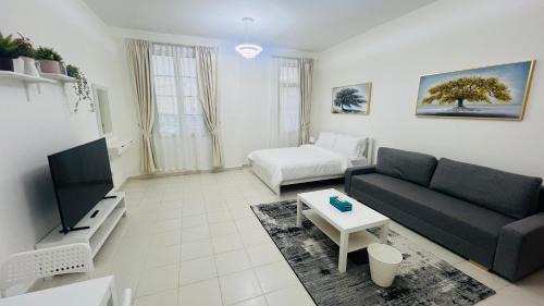 International City Apartment | France cluster International city - Spacious Bright Furnished Studio apartment