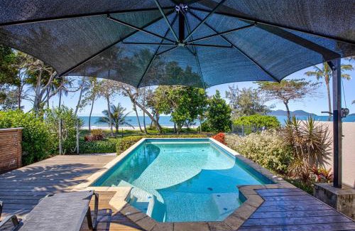 Wongaling Beach Apartment | Frangipani Place - Absolute Beachfront