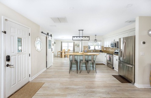 Pinellas Park House | FREE Heated Pool Home near the beaches Slps 12 Water Slide Fire Pit