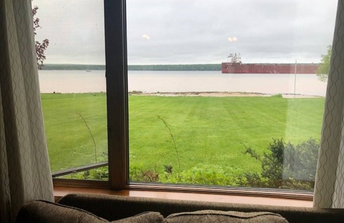 Sault Ste. Marie House | Freighters in front yard! Private Sandy Beach - Large Deck - Best View on River