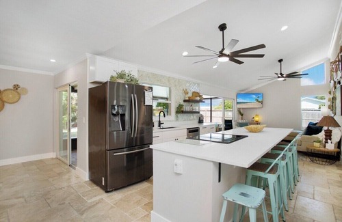 Cypress Lake House | Fresh Coastal Eclectic, Heated Pool Sleeps 9