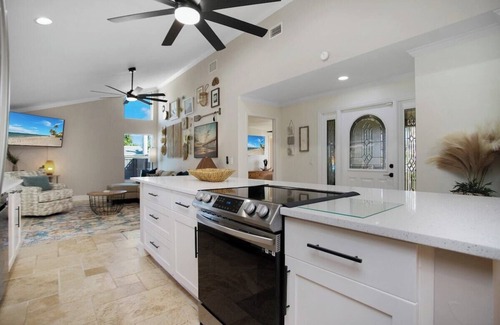 Cypress Lake House | Fresh Coastal Eclectic, Heated Pool Sleeps 9