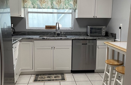 Cape Cay House | Friendly and quite neighborhood, waterfront view, kayaks or go fishing.