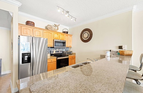 Open Sands Condo | Friendly Starfish @ Ocean Reef enjoy spacious 4-br 3 bath Spacious Corner unit
