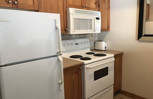 Silver Star Mountain Apartment | Fully Equipped Creekside Studio with Outdoor Shared Hot Tub and Pet Friendly!