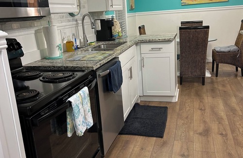 Vista Del Mar House | Fully remodeled, adorable coastal canal house on a spacious corner lot.