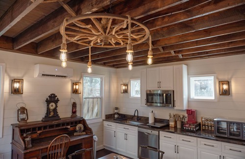 Cleveland Park House | Fully renovated 1800s Carriage House seamlessly blends history w/modern luxury.