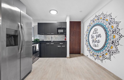 Parque Apartment | Fully Renovated Coastal Apartment Steps from the Beach with Private Parking