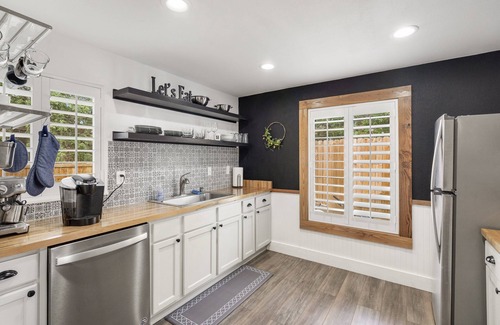 Johnson City House | Fully restored 1960s home, large corner lot, 6 Beds, blocks from town center.