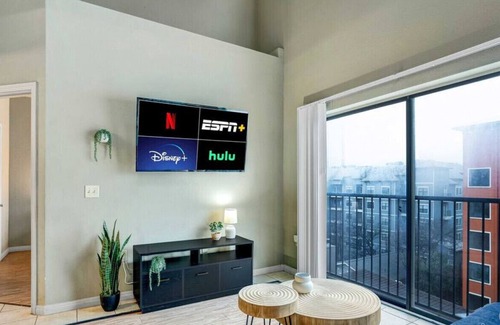 West Campus Apartment | Fun Location! Elevator + Full Kitchen + Laundry!