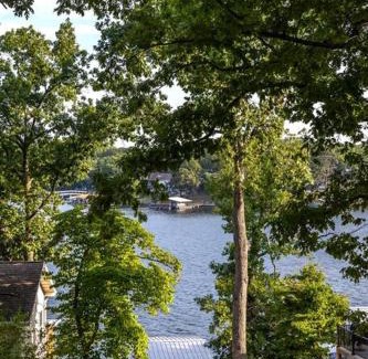 Sunrise Beach House | Funky Little Lakehouse - private dock and sunset view