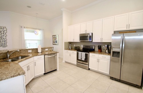 Loughman Villa | FUNTASTIC 1 LEVEL 5/4 POOL HOME- NATURE VIEW-NEAR DISNEY-FREE RESORT