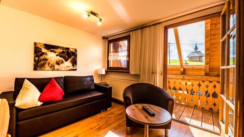 Frohnd Apartment | Gästehaus Holzer Kreuz - Ferienwohnung "Mohn"