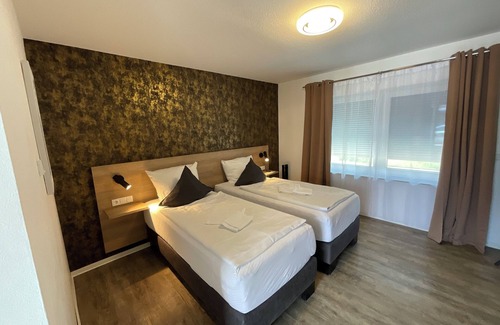 Estenfeld Hotel | Gästezimmer nahe Würzburg - schöne, saubere & preiswerte Zimmer, an der A7