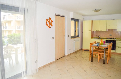 Foggetta Apartment | G.Bay A06 - Mezzanine apartment with garden, overlooking the pool