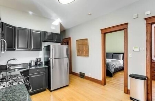 Logan Square Apartment | Garage Parking - Vintage Charm - and a Fabulous Location! Easily Enjoy the Best of Chicago! by AllSet Turnover