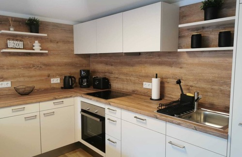 Malter Apartment | Garden view apartment with pool and children's playground