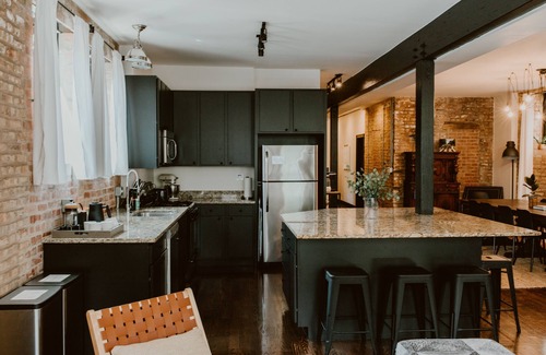 West Lakeview Condo | Gather Together & WFH in Piece of Chicago History