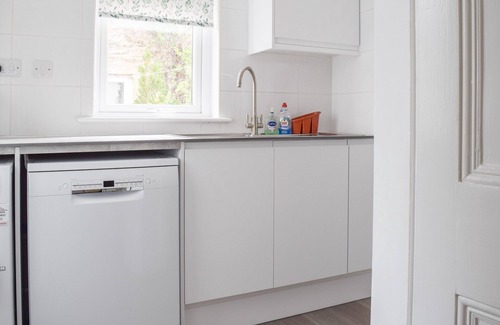 Linton-in-Craven Cottage | Ground Floor: Living room: TV, Freesat, DVD Player, Open Fire Dining room.