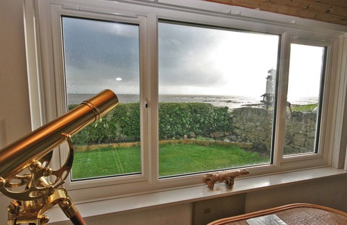 Southerness Cottage | This beach front cottage oozes charm, in a stunning location with sea views.