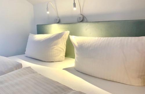 Bad Wiessee Apartment | Gemütliche Ferienwohnung am Tegernsee - ruhig im Dachgeschoss