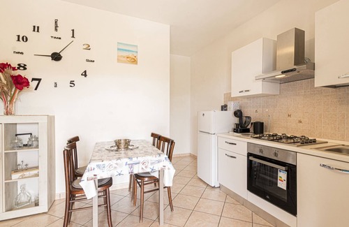Seccheto Apartment | Ginevra Apartment in Seccheto, with equipped porch with splendid sea view, close to the center and t