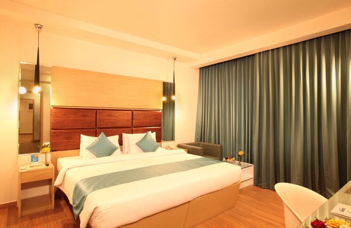 Shenoys Hotel | Ginger Kochi MG Road