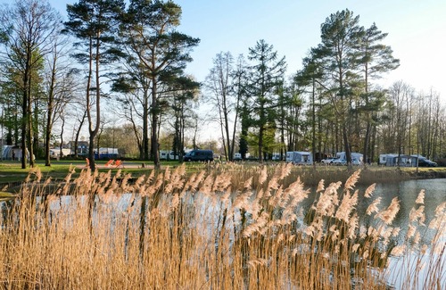 Jever RV Rental | Glamping tent for 4P with terrace by the lake