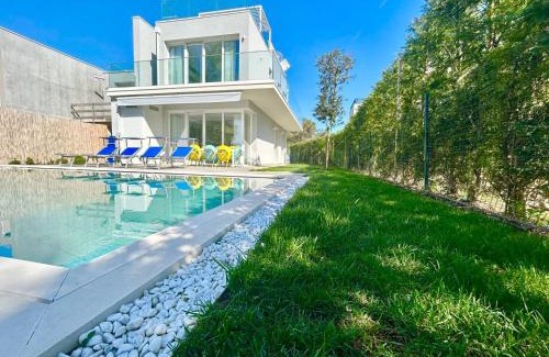 Isola Albarella Villa | Golden hour retreat lagoon view villa with pool