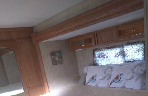 Surfside Beach House | Golf cart included ,nice RV king bed