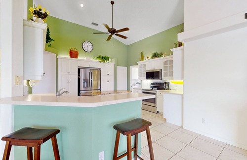 White Marsh House | Golf course front home with private pool, lanai, & internet