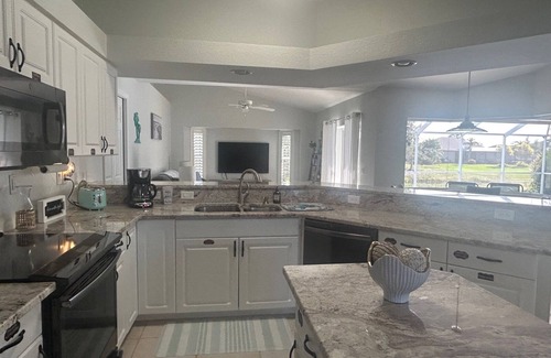 White Marsh House | Gone Coastal - water view with fishing dock