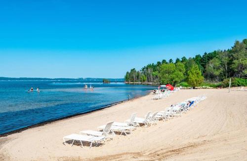 Acme Apartment | Gorgeous Grand Traverse Bay Beach Front Condo