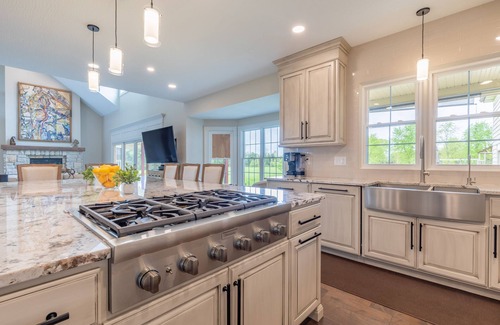Radnor House | Gorgeous Home featuring an Indoor Heated Pool, Gourmet Kitchen & Outdoor Spaces