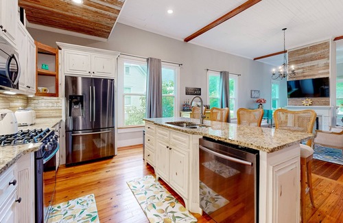 Covington House | Gorgeous home half a mile from Covington Square with streaming, golf cart, & AC