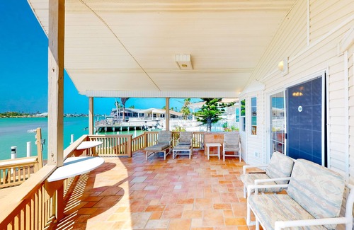 Port Isabel Cottage | Gorgeous Intercoastal waterfront home on channel w/shared pool, hot tub, & dock