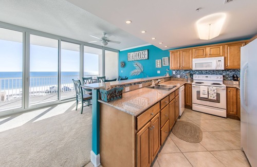 Gulf Shores Condo | GORGEOUS LUXURY CONDO, 30 FOOT WALL OF GLASS! SPECTACULAR VIEWS. Fully equipped