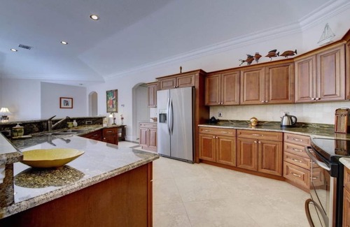 Cocoa Beach House | Gorgeous MEDITERRANEAN STYLE. Private courtyard w/POOL. Easy walk to the Beach!