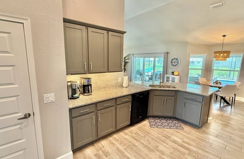 Pinehurst House | Gorgeous Newer 4bd/2ba Canal Home, Large Heated Pool/Hot Tub, Game Room, Pets Ok