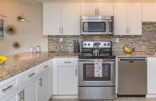 New Smyrna Beach Condo | Gorgeous Oceanfront Condo-Walk to Flagler-Updated Beachy Chic-Best NSB Location!