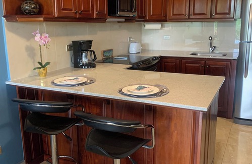 Coco Sunset Hills Condo | Gorgeous Poolside Condo w/Rooftop Deck - blocks from the beach -