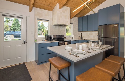Big Sky House | Gorgeous remodeled, cozy condo with fireplace and community hot tub and sauna