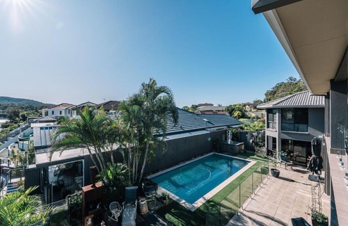 Oxenford House | Gorgeous Riverfront 5BR House with Pool