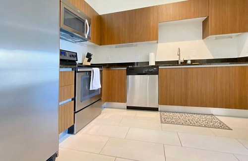 Channel District Apartment | Gorgeous Top Floor with Courtyard Views in Channelside