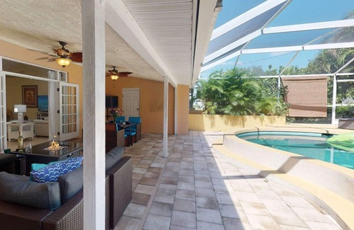 Bay Acres House | Gorgeous Updated Heated Saltwater Pool Home, WiFi, Dog Friendly, Kayak Launch & Park, Garage