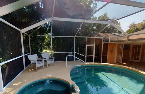 Bay Acres House | Gorgeous Updated Heated Saltwater Pool Home, WiFi, Dog Friendly, Kayak Launch & Park, Garage